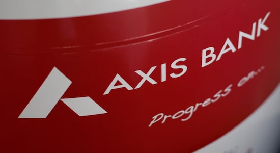The logo of Axis Bank is seen on an advertisement at its branch in Mumbai