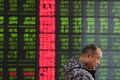 Asian shares edge up as US bond yields come off late-2017 lows