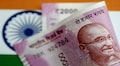 Rupee opens lower at 69.40 a dollar, bond yields fall