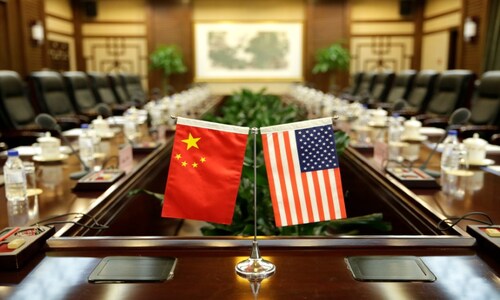 China vows to defend its own interests in US trade talks