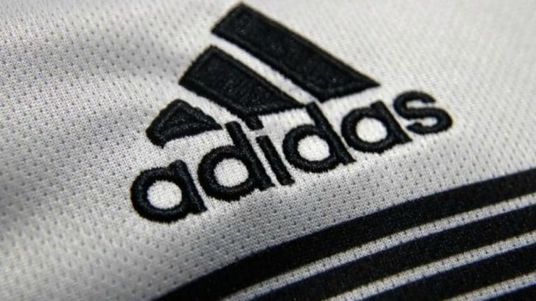 Adidas hikes 2018 profit outlook on top 