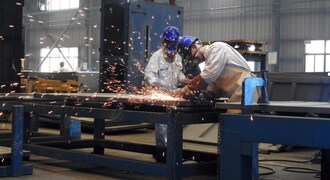 US industrial output dips in May as manufacturing declines
