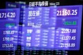 Asian stocks slide as bond markets send recession warning