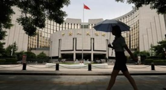 China's central bank unexpectedly holds fire on rates as economy wobbles