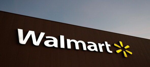 Walmart sees sales rise at stores and online, raises outlook