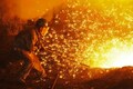 China industrial output growth falls to 17-year low, but investment picks up