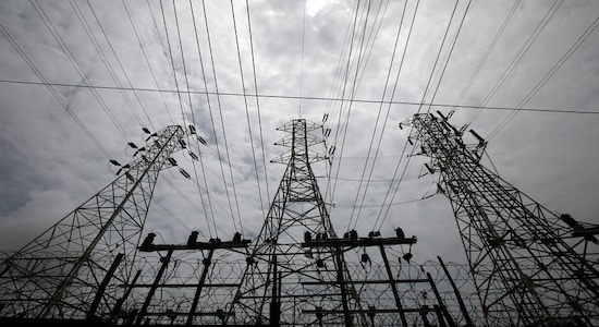 FILE PHOTO - High-tension power lines are pictured outside a Tata Power sub station in the suburbs of Mumbai, India, August 8, 2017. REUTERS/Shailesh Andrade/File Photo
