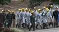 All 12 boys and their football coach rescued from Thailand cave