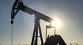 Oil prices fall on weaker oil demand growth, surprise rise in US crude stocks