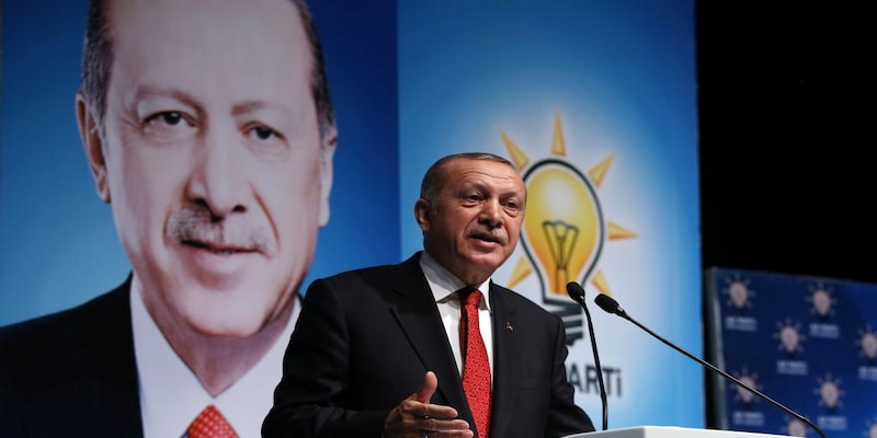 Turkey's Tayyip Erdogan stands by opposition to high interest rates
