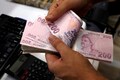 Qatar to aid Turkey, currency rallies but US says tariffs to stay