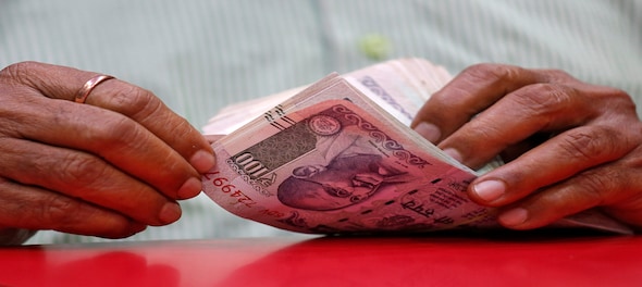 India bonds, rupee fall as exit polls mixed for Modi, oil rises