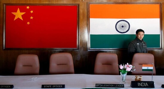 A man walks inside a conference room used for meetings between military commanders of China and India, at the Indian side of the Indo-China border at Bumla, in the northeastern Indian state of Arunachal Pradesh, November 11, 2009. REUTERS/Adnan Abidi/Files A man walks inside a conference room used for meetings between military commanders of China and India, at the Indian side of the Indo-China border at Bumla, in the northeastern Indian state of Arunachal Pradesh, November 11, 2009. REUTERS/Adnan Abidi/Files