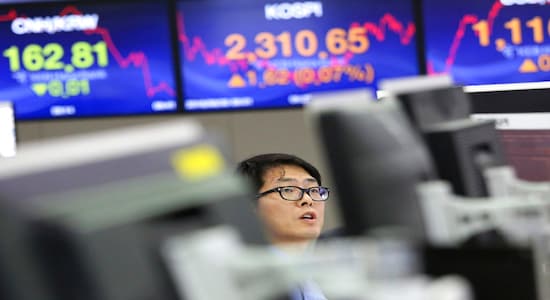 Asian stocks gained a tad on Wednesday after US-China trade talks resumed while investors awaited minutes from the US Federal Reserve for clues on policymakers' thinking on interest rates and its balance sheet reduction policy. MSCI's broadest index of Asia-Pacific shares outside Japan rose 0.2 percent in early trade. Japan's Nikkei gained 0.4 percent. (Image: AP/Caption credits: Reuters)