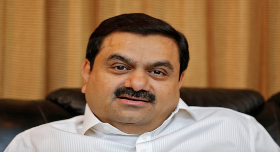 Indian billionaire Gautam Adani speaks during an interview with Reuters at his office in Ahmedabad, India, April 2, 2014. REUTERS/Amit Dave/File Photo - S1BETSDEMWAA