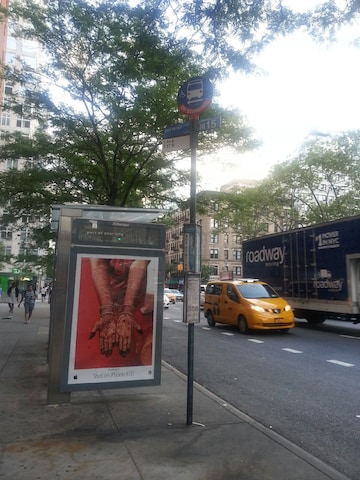 Mehndi ad on a bus stop in Manhattan