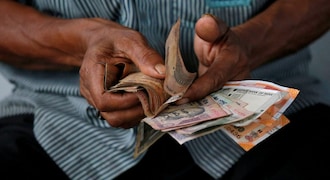 Rupee falls 12 paise to 73.89 against US dollar on geopolitical worries