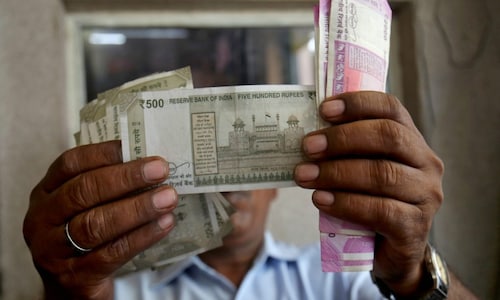 Rupee opens flat at 71.65 against dollar