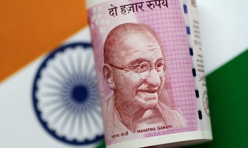 Rupee gains 16 paise to 69.77 a dollar in opening trade, bond yields fall