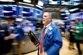 Wall Street edges higher on earnings optimism