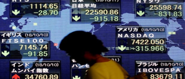 Asian shares skid as Apple warning stokes growth fears, 'flash crash' sweeps currencies