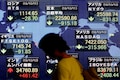 Asian shares skid as Apple warning stokes growth fears, 'flash crash' sweeps currencies
