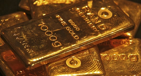 Gold nears five-month peak as dollar, stocks decline