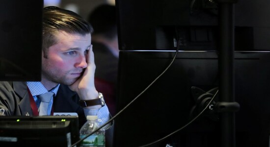 Traders work on the floor at the New York Stock Exchange (NYSE) in New York City, U.S., November 20, 2018. REUTERS/Brendan McDermid Traders work on the floor at the New York Stock Exchange (NYSE) in New York City, U.S., November 20, 2018. REUTERS/Brendan McDermid