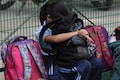 India throws book at schools making young pupils carry heavy bags
