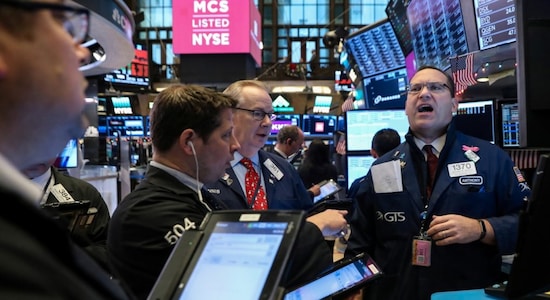 Wall Street edges lower, energy stocks fall