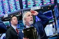 US stocks turn higher after Fed says it will keep rates low
