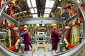 China's factory output posts first increase for 2020 but consumption still weak