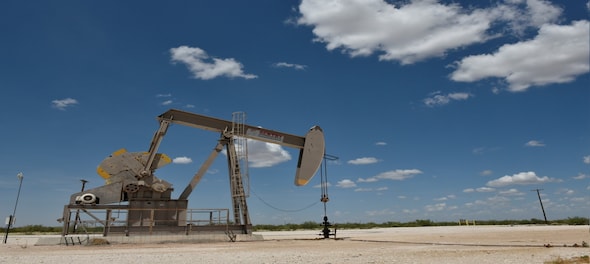 Oil prices edge down as US fuel stockpiles grow more than expected