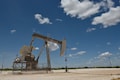 Oil dips as US crude production hits record, Asia factory output weakens