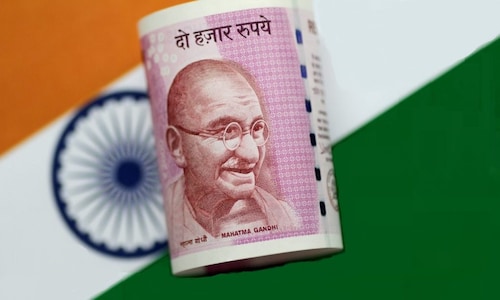 Rupee gains 38 paise to close at 2-week high against dollar
