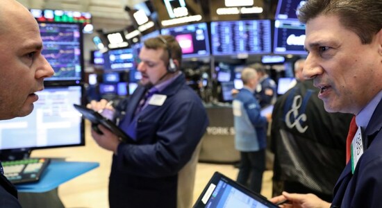 Wall Street closes slightly higher, industrials lead