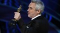 'Roma' wins two early Oscars as Queen rocks show without a host