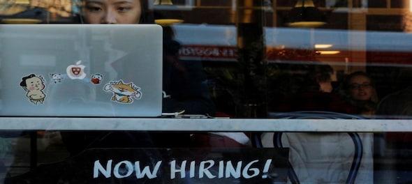 US unemployment claims fall slightly to 411,000 as job market slowly heals
