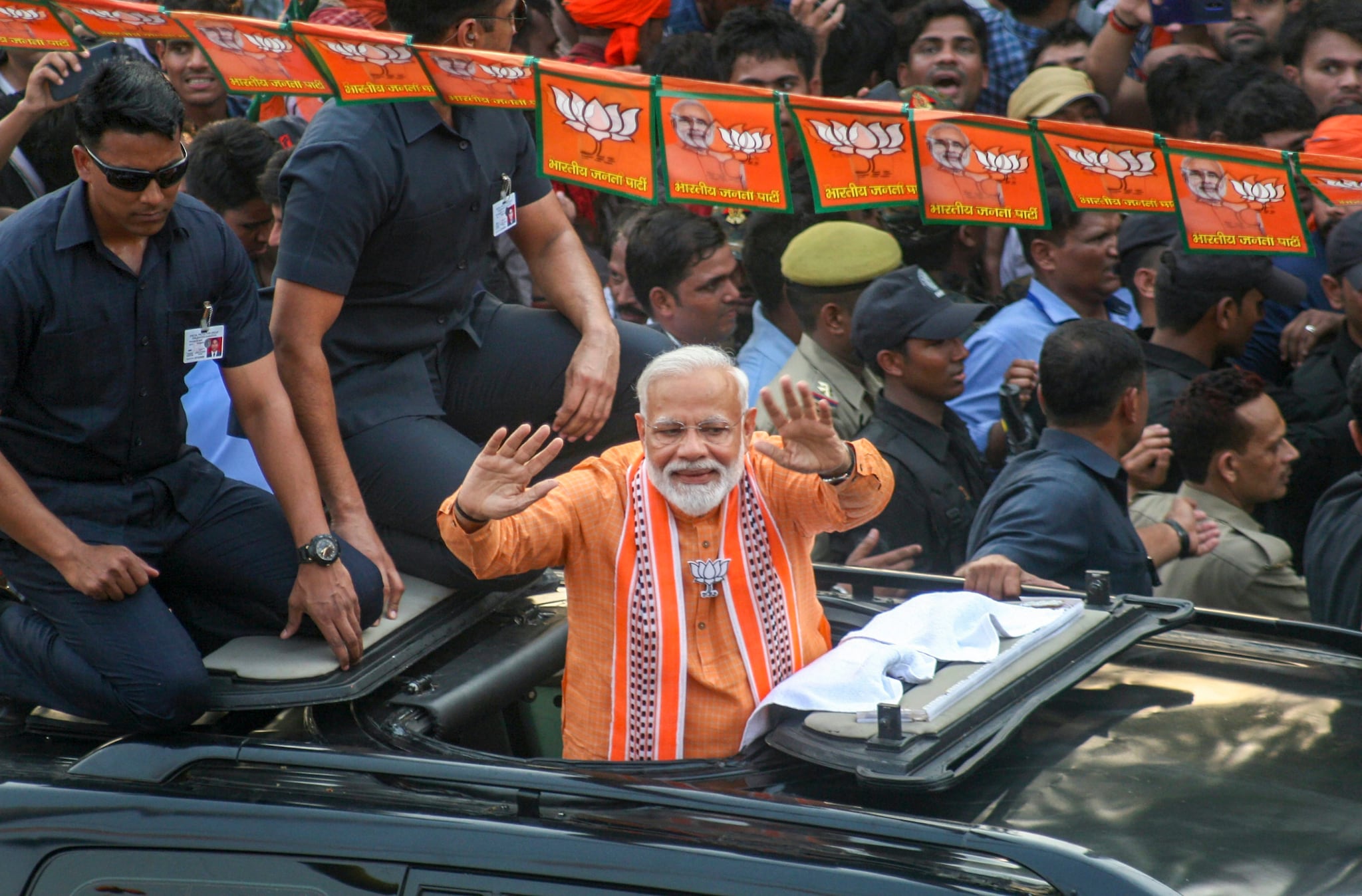 Pm Modi Holds Mega Roadshow In Varanasi Performs Ganga Aarti