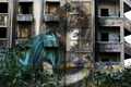 Decades on, war-scarred Beirut buildings remain