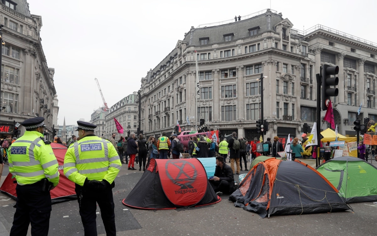 UK police arrest more than 100 in climate change protests - cnbctv18.com