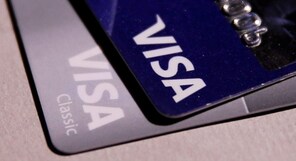 Americans may soon need to carry fewer debit and credit cards in their wallets: Here's why