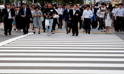 Japan's economy shrinks at record pace as pandemic wipes out 'Abenomics' gains