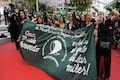 In Pictures: Clad in green, film crew protest Argentina abortion law on Cannes red carpet