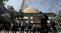 Sensex, Nifty trade flat as metal, auto shares offset gains in banks, financials