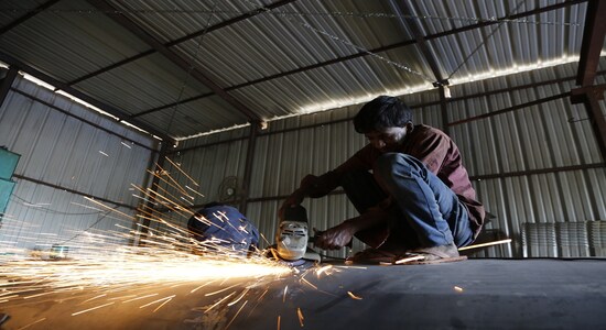 A worker welds together a water tanker at a local manufacturing workshop in Bangalore, India on March 12, 2019. Thomson Reuters Foundation/Rajan Zaveri A worker welds together a water tanker at a local manufacturing workshop in Bangalore, India on March 12, 2019. Thomson Reuters Foundation/Rajan Zaveri