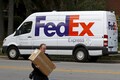 FedEx lowers sales forecast for fiscal, profit falls below expectations on drop in air and truck cargo