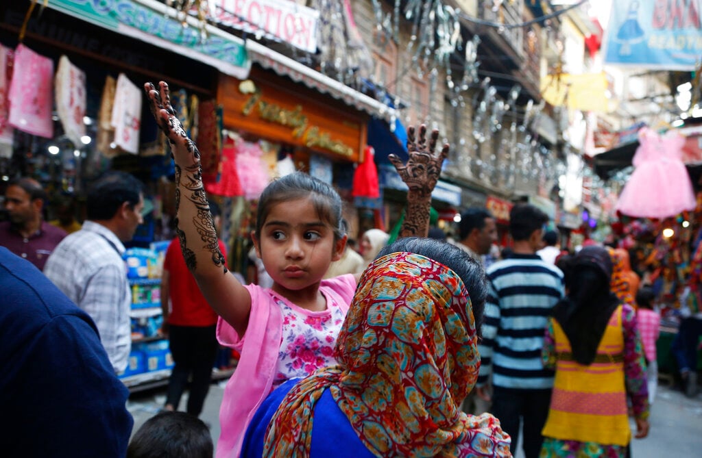 In Pictures: People get ready to bid adieu to Ramadan as 