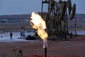 Oil edges lower amid doubts over OPEC cuts