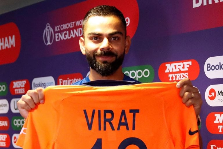 virat kohli in orange jersey